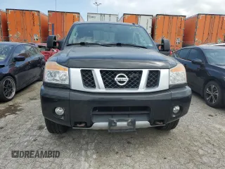 2015 Nissan Titan Pro-4X with VIN 1N6BA0EC1FN507894, listed as a Copart auction lot 65784274 with 147,576 mi miles and Salvage title. Bid and sale history available at DreamBid. Image 5.
