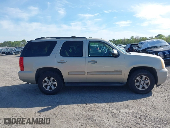 2010 GMC Yukon SLT with VIN 1GKMCCE3XAR225380, listed as a IAAI auction lot 41904723 with 173,686 mi miles. Bid and sale history available at carsss.com. Image 13.