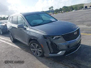 2021 Cadillac XT6 Premium Luxury with VIN 1GYKPCRS8MZ212943, listed as a IAAI auction lot 41945274 with 25,094 mi miles and . Bid and sale history available at DreamBid. Image 1.