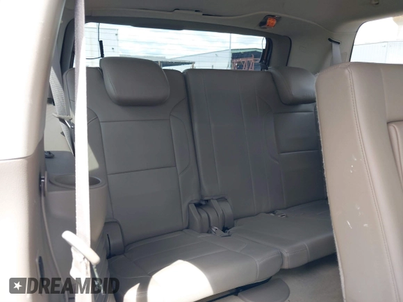 2015 Chevrolet Tahoe LT with VIN 1GNSCBKCXFR214072, listed as a IAAI auction lot 40512435 with 98,955 mi miles and . Bid and sale history available at DreamBid. Image 18.