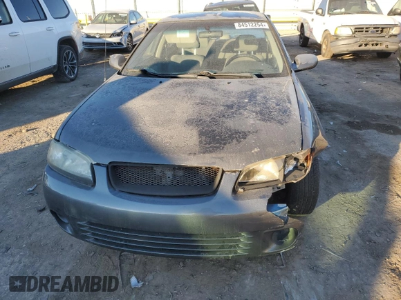 2000 Nissan Sentra XE with VIN 3N1CB51D3YL316712, listed as a Copart auction lot 84512254 with 228,070 mi miles and Salvage title. Bid and sale history available at DreamBid. Image 5.