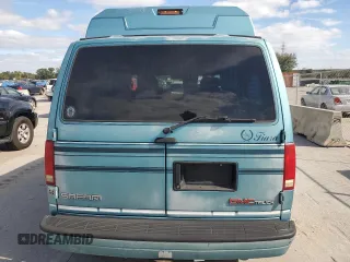 1995 GMC Safari z VIN 1GDDM19W2SB525888, wystawiony jako Copart lot #81358954 z przebiegiem 121 066 mil mil oraz Szkody całkowita. Historia ofert i sprzedaży dostępna na DreamBid. Obrazek 6.