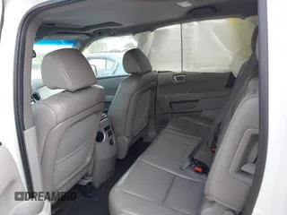 2013 Honda Pilot EX-L with VIN 5FNYF3H70DB043832, listed as a IAAI auction lot 40880885 with 250,712 mi miles and . Bid and sale history available at DreamBid. Image 8.