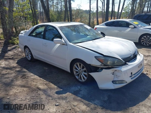2003 Toyota Camry LE z VIN JTDBF30K930147772, wystawiony jako IAAI lot #41768713 z przebiegiem 231 537 mil mil oraz . Historia ofert i sprzedaży dostępna na DreamBid. Obrazek 1.