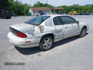 1998 Chevrolet Monte Carlo LS z VIN 2G1WW12MXW9114335, wystawiony jako IAAI lot #42284798 z przebiegiem 214 728 mil mil oraz . Historia ofert i sprzedaży dostępna na DreamBid. Obrazek 4.