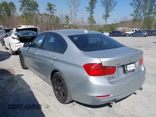 2014 BMW 3 Series 335i xDrive with VIN WBA3B9G52ENR91044, listed as a IAAI auction lot 41807408 with 200,000 mi miles and . Bid and sale history available at carsss.com. Image 14.