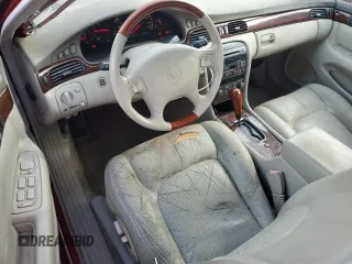 1999 Cadillac Seville Touring STS z VIN 1G6KY5496XU926352, wystawiony jako Copart lot #74711014 z przebiegiem 140 915 mil mil oraz Nie do naprawy • Non repairable. Historia ofert i sprzedaży dostępna na DreamBid. Obrazek 8.