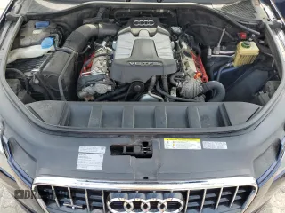 2013 Audi Q7 Premium Plus with VIN WA1LGAFE6DD010512, listed as a Copart auction lot 65572335 with 195,066 mi miles and Clean title. Bid and sale history available at DreamBid. Image 12.