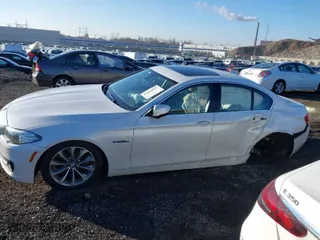 2016 BMW 5 Series 528i xDrive with VIN WBA5A7C52GG150287, listed as a IAAI auction lot 41684813 with 128,768 mi miles. Bid and sale history available at carsss.com. Image 14.