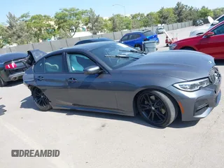2021 BMW 3 Series 330i с VIN 3MW5R1J03M8B96458, выставлен на аукционе IAAI как лот 42355921 с пробегом Не указан миль и . История ставок и продаж доступна на DreamBid. Изображение 14.