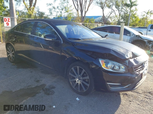 2017 Volvo S60 Inscription with VIN LYV402HK7HB130410, listed as a IAAI auction lot 41751317 with 97,339 mi miles. Bid and sale history available at carsss.com. Image 1.