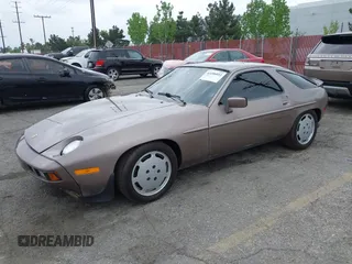 1983 Porsche 928 z VIN WP0JB0928DS860094, wystawiony jako IAAI lot #42106022 z przebiegiem 121 873 mil mil oraz . Historia ofert i sprzedaży dostępna na DreamBid. Obrazek 18.