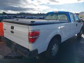 2014 Ford F-150 XL with VIN 1FTFX1CF4EKG53325, listed as a IAAI auction lot 41060015 with 216,554 mi miles. Bid and sale history available at carsss.com. Image 6.