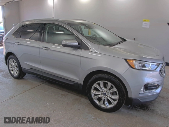 2020 Ford Edge Titanium z VIN 2FMPK4K91LBA91290, wystawiony jako IAAI lot #42494043 z przebiegiem 71 254 mil mil oraz . Historia ofert i sprzedaży dostępna na DreamBid. Obrazek 22.