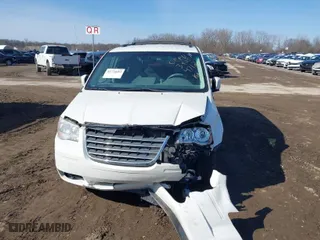 2009 Chrysler Town & Country Touring with VIN 2A8HR541X9R674712, listed as a IAAI auction lot 41776683 with 136,170 mi miles. Bid and sale history available at carsss.com. Image 6.