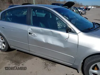 2003 Nissan Altima S with VIN 1N4AL11D63C321486, listed as a IAAI auction lot 41581386 with 200,082 mi miles. Bid and sale history available at carsss.com. Image 6.