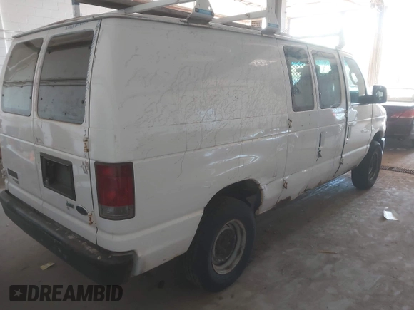 2011 Ford Econoline Cargo Commercial with VIN 1FTNE2EW9BDB11058, listed as a IAAI auction lot 42202069 with 282,179 mi miles. Bid and sale history available at carsss.com. Image 4.
