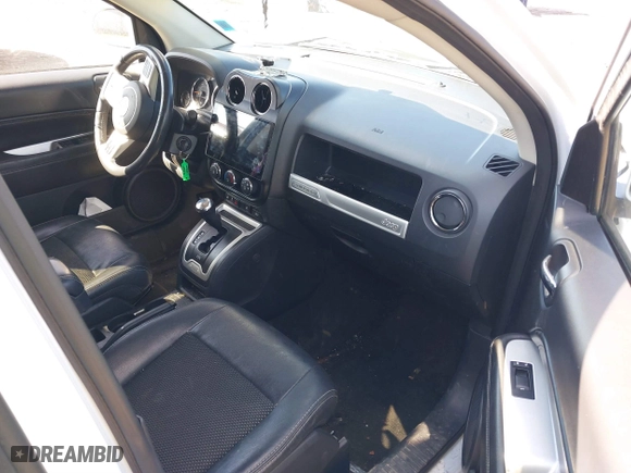 2016 Jeep Compass High Altitude Edition with VIN 1C4NJDEBXGD635864, listed as a IAAI auction lot 41895063 with 95,246 mi miles. Bid and sale history available at carsss.com. Image 5.