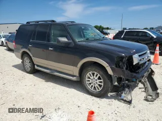 2014 Ford Expedition XLT z VIN 1FMJU1H55EEF14723, wystawiony jako Copart lot #56455855 z przebiegiem 163 748 mil mil oraz Szkoda całkowita • Salvage title. Historia ofert i sprzedaży dostępna na DreamBid. Obrazek 4.