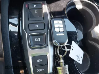 2021 Honda Passport Touring z VIN 5FNYF8H91MB022986, wystawiony jako IAAI lot #42077321 z przebiegiem 20 497 mil mil oraz . Historia ofert i sprzedaży dostępna na DreamBid. Obrazek 11.