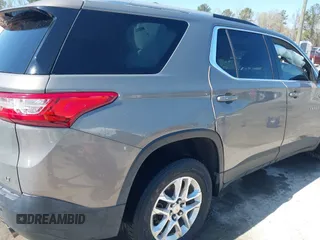2018 Chevrolet Traverse LT Cloth z VIN 1GNEVGKW4JJ281837, wystawiony jako IAAI lot #41919081 z przebiegiem 91 496 mil mil oraz . Historia ofert i sprzedaży dostępna na DreamBid. Obrazek 6.