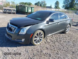 2013 Cadillac XTS Luxury with VIN 2G61P5S3XD9228218, listed as a IAAI auction lot 40503666 with 87,857 mi miles. Bid and sale history available at carsss.com. Image 17.
