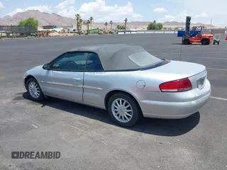 2001 Chrysler Sebring z VIN 1C3EL45UX1N624672, wystawiony jako IAAI lot #42423100 z przebiegiem 49 826 mil mil oraz . Historia ofert i sprzedaży dostępna na DreamBid. Obrazek 3.