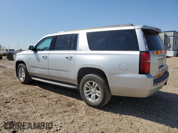2020 Chevrolet Suburban LT z VIN 1GNSKHKC0LR285945, wystawiony jako Copart lot #56207225 z przebiegiem 208 281 mil mil oraz Czysty tytuł • Clean title. Historia ofert i sprzedaży dostępna na DreamBid. Obrazek 2.