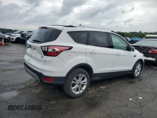 2017 Ford Escape SE z VIN 1FMCU0GD7HUC33240, wystawiony jako Copart lot #59627995 z przebiegiem 105 670 mil mil oraz Czysty tytuł • Clean title. Historia ofert i sprzedaży dostępna na DreamBid. Obrazek 3.