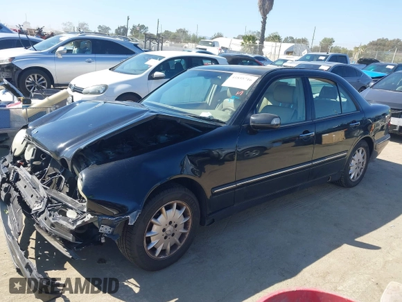 2001 Mercedes-Benz E-Class with VIN WDBJF65J11B368277, listed as a IAAI auction lot 41855716 with 207,864 mi miles. Bid and sale history available at carsss.com. Image 17.
