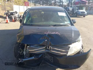 2011 Honda Odyssey EX-L with VIN 5FNRL5H61BB059275, listed as a IAAI auction lot 41293690 with 105,511 mi miles and . Bid and sale history available at carsss.com. Image 12.