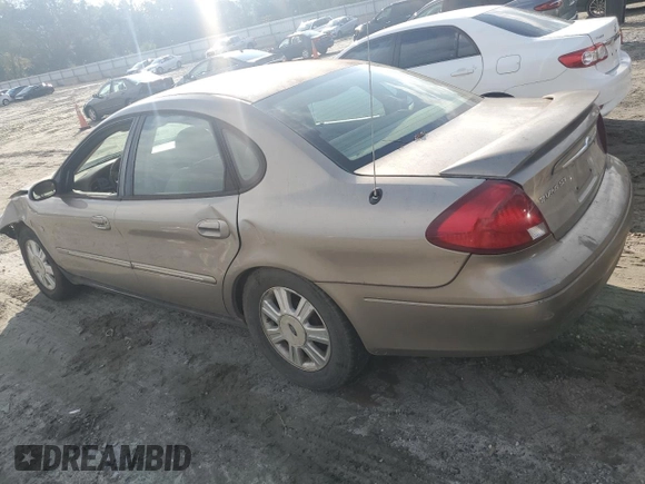 2003 Ford Taurus SEL Deluxe with VIN 1FAHP56SX3A243775, listed as a Copart auction lot 72245394 with 251,041 mi miles and Salvage Title. Bid and sale history available at DreamBid. Image 2.