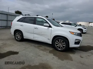 2012 Kia Sorento SX z VIN 5XYKWDA25CG280219, wystawiony jako Copart lot #54397025 z przebiegiem 197 685 mil mil oraz Szkoda całkowita • Salvage title. Historia ofert i sprzedaży dostępna na DreamBid. Obrazek 4.