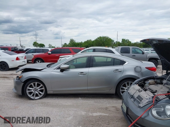 2014 Mazda 6 i Touring with VIN JM1GJ1T51E1106970, listed as a IAAI auction lot 42027350 with 113,756 mi miles and . Bid and sale history available at DreamBid. Image 14.