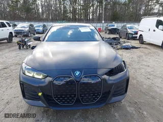 2023 BMW i4 M50 with VIN WBY33AW04PFP30422, listed as a IAAI auction lot 41359006 with 23,199 mi miles. Bid and sale history available at carsss.com. Image 13.