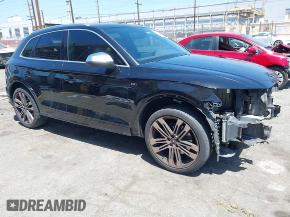2018 Audi SQ5 Premium Plus z VIN WA1A4AFY1J2008989, wystawiony jako IAAI lot #42249709 z przebiegiem 82 188 mil mil oraz . Historia ofert i sprzedaży dostępna na DreamBid. Obrazek 1.