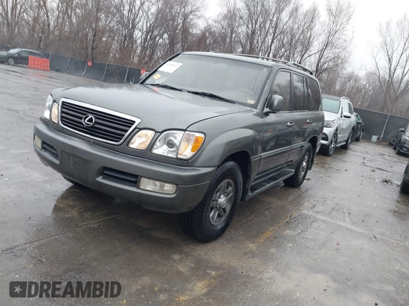 2002 Lexus LX 470 with VIN JTJHT00W923515897, listed as a IAAI auction lot 41155492 with 244,619 mi miles. Bid and sale history available at carsss.com. Image 17.