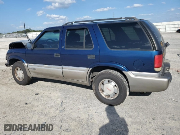 2001 GMC Jimmy SL z VIN 1GKCS13WX12112182, wystawiony jako Copart lot #73460264 z przebiegiem Nie podano mil oraz Nie do naprawy • Non repairable. Historia ofert i sprzedaży dostępna na DreamBid. Obrazek 2.