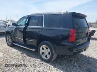 2018 Chevrolet Tahoe LT with VIN 1GNSKBKC7JR245565, listed as a IAAI auction lot 42097400 with 123,709 mi miles and . Bid and sale history available at DreamBid. Image 3.