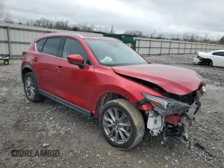 2021 Mazda CX-5 Grand Touring Reserve with VIN JM3KFBAY5M0313517, listed as a Copart auction lot 42815805 with 34,028 mi miles and Salvage Title. Bid and sale history available at carsss.com. Image 4.