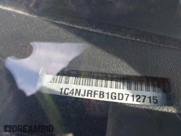2016 Jeep Patriot High Altitude Edition with VIN 1C4NJRFB1GD712715, listed as a IAAI auction lot 41984245 with 124,227 mi miles. Bid and sale history available at carsss.com. Image 9.