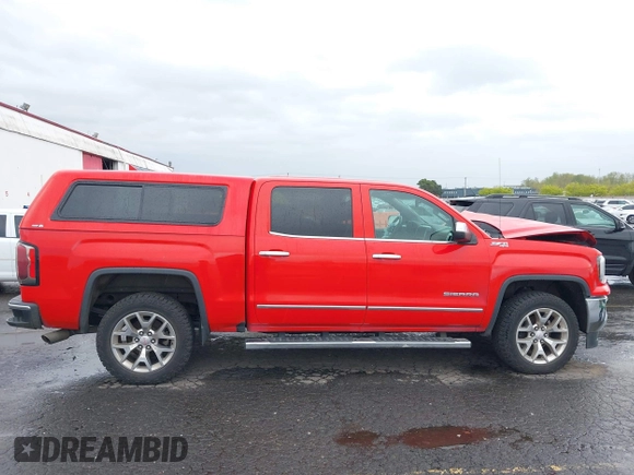2017 GMC Sierra 1500 SLT z VIN 3GTU2NEC8HG279653, wystawiony jako IAAI lot #41988040 z przebiegiem 58 224 mil mil oraz . Historia ofert i sprzedaży dostępna na DreamBid. Obrazek 13.