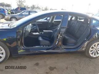2022 Tesla Model 3 with VIN 5YJ3E1EA9NF295890, listed as a IAAI auction lot 41175917 with 42,230 mi miles and . Bid and sale history available at DreamBid. Image 15.