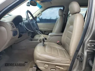 2002 Ford Explorer XLT with VIN 1FMZU63K32UD65713, listed as a Copart auction lot 54767205 with 255,013 mi miles and Salvage Title. Bid and sale history available at DreamBid. Image 7.