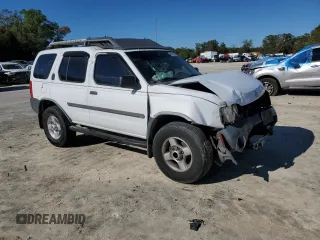 2003 Nissan Xterra XE with VIN 5N1ED28TX3C674546, listed as a Copart auction lot 48791945 with 219,132 mi miles and Salvage Title. Bid and sale history available at carsss.com. Image 4.