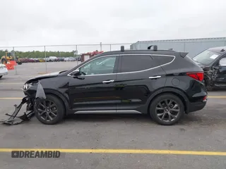 2018 Hyundai Santa Fe Ultimate with VIN 5XYZWDLA6JG570808, listed as a IAAI auction lot 41941878 with 47,391 mi miles and . Bid and sale history available at DreamBid. Image 14.