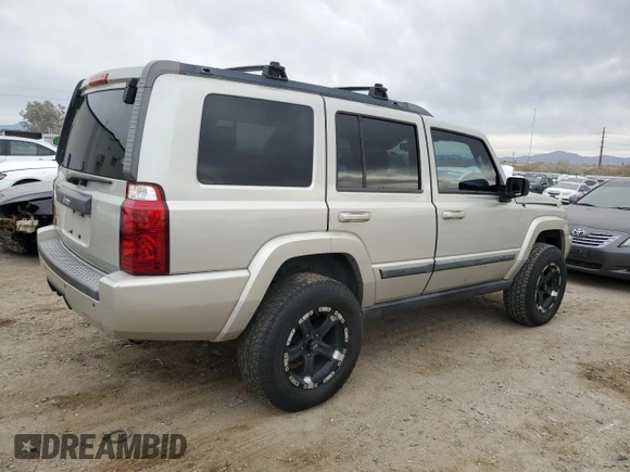 2009 Jeep Commander Sport z VIN 1J8HH48K79C519351, wystawiony jako Copart lot #44996585 z przebiegiem 153 891 mil mil oraz Czysty tytuł • Clean title. Historia ofert i sprzedaży dostępna na DreamBid. Obrazek 3.