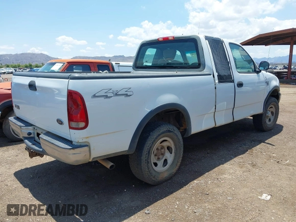 2002 Ford F-150 XL with VIN 2FTRX18W02CA22920, listed as a IAAI auction lot 42426790 with 153,433 mi miles and . Bid and sale history available at DreamBid. Image 4.