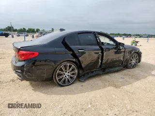 2018 BMW 5 Series 540i xDrive with VIN WBAJE7C52JWD52730, listed as a Copart auction lot 60297425 with 104,208 mi miles and Salvage title. Bid and sale history available at DreamBid. Image 3.