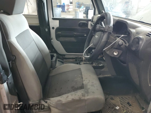 2008 Jeep Wrangler X с VIN 1J4FZ24138L526514, выставлен на аукционе Copart как лот 72569194 с пробегом 216 928 миль миль и Списание • Salvage title. История ставок и продаж доступна на DreamBid. Изображение 7.